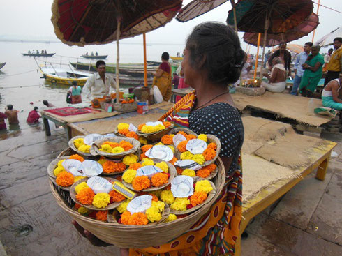 2013 Varanasi - A Vendor sells Candle Offerings to be Floated down the River Ganges