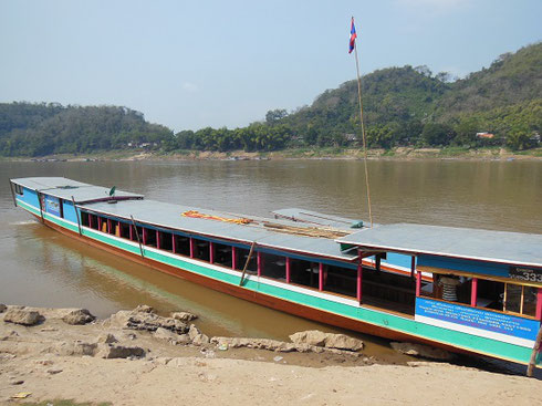 2015 We chartered this traditional Riverboat up the Mekong to the Pak Ou Buddhist Caves