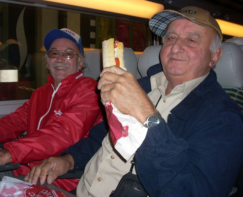 Armand Salutes with his Ham & Cheese Baguette Aboard the High Speed Train to Avignon