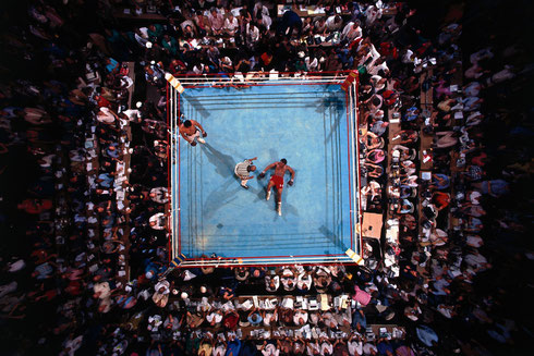Aerial view of Foreman on canvas during count by referee Zach Clayton after round 8 knockout by Ali at Stade du 20 Mai, in Kinshasa, Zaire October 30, 1974 (Neil Leifer /Sports Illustrated)