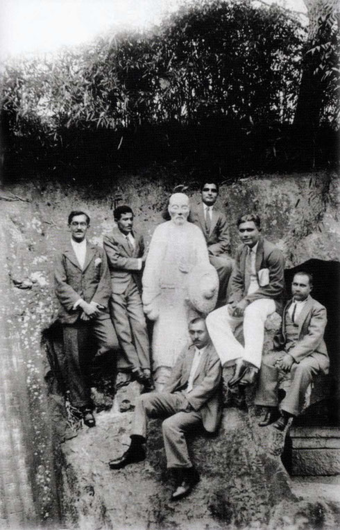 China, 1932 - Men mandali at the statue of Deng Shiru and his cave in Hangzhou, China, prior to Meher Baba's visit.