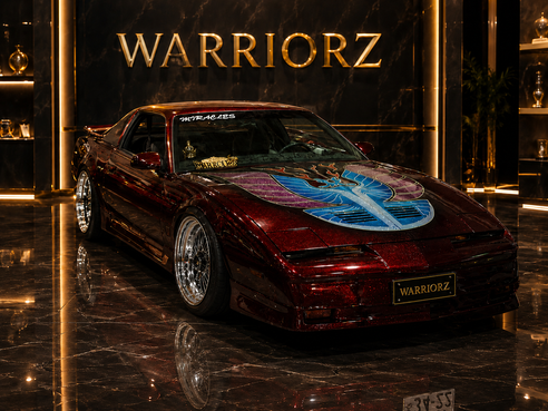 カスタムペイント車、キャンディーフレークレッドでソウルペイントされた1988年トランザムGTA