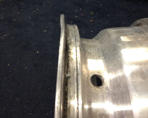 A bit of a bend in this one. Sent it out to be straightened by Cliff Jacobs wheel repair.  http://www.cjwheelrepair.com (click on the picture and it will open up a link)