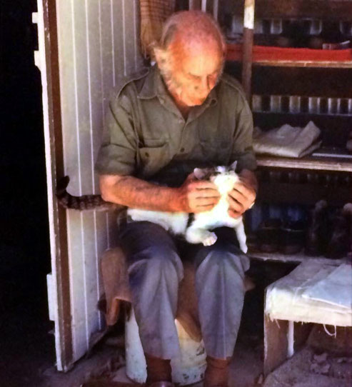 Francis at Avatar's Abode playing with a local cat.
