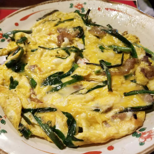 屋台：なんしようと屋、料理：にらとじ