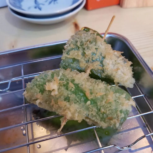 Stall:Ultra C  Food:fried pork and negi on skewers ,green bell pepper