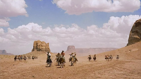 John Ford shot the chase scene with John Wayne in "The Searchers" in the Square Rock area in Monument Valley.