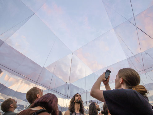 The fully mirrored room making endless reflections of the visitors. Project for the Ars Electronica Festival - Art Installation for the University of Arts Linz.