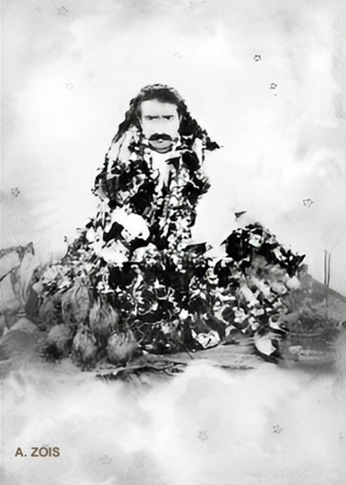 Meher Baba & the coconuts and fruit offered to him. Image eng=hanced by Anthony Zois.