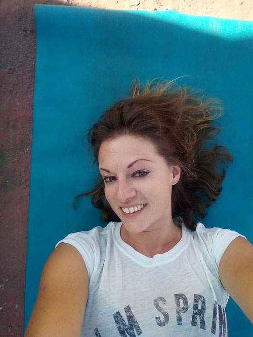 Taken on the rooftop at the community where I lived after my own Yoga practices. I was really happy in that moment.