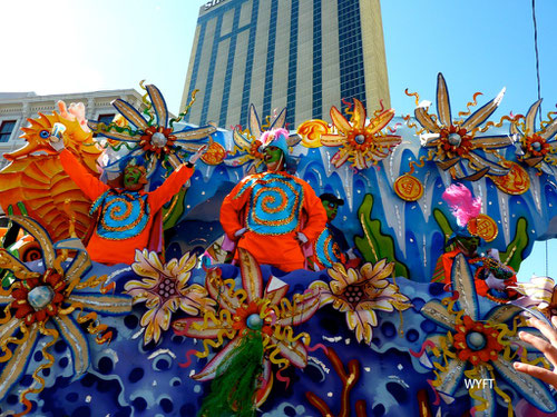 © Winifred. Mardi Gras Parade, New Orlean. Mardi Gras 2012 is on Feb 21. We were part of this mother of all parades and celebration in 2010. It was wild, colourful, full of energy and fun! "Give me something sir!"