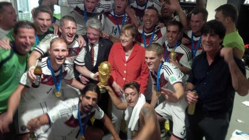 The German national team with chancellor Angela Merkel and the president Joachim Gauck after their world cup win