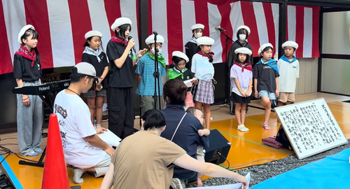 沢内民区　写真：子ども会有志による「沢内民区の唄」復活披露(令和７年夏まつりにて)の画像