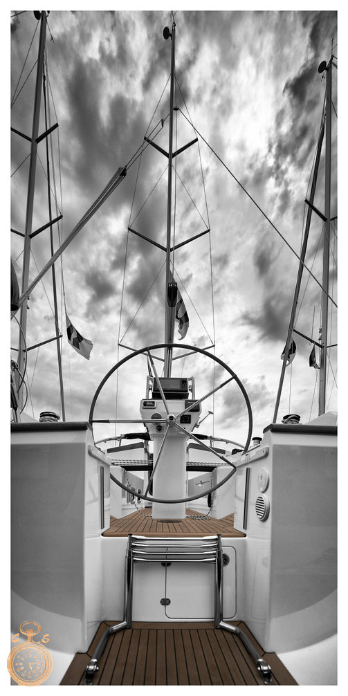 Sailboat in black white against a strong sky, Color Touch Effects