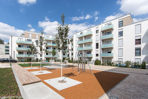Foto einer neugebauten Wohnanlage. Architekturfotograf München für Immobilienfotografie, Baustellenfotografie und Architektur-Reportagen