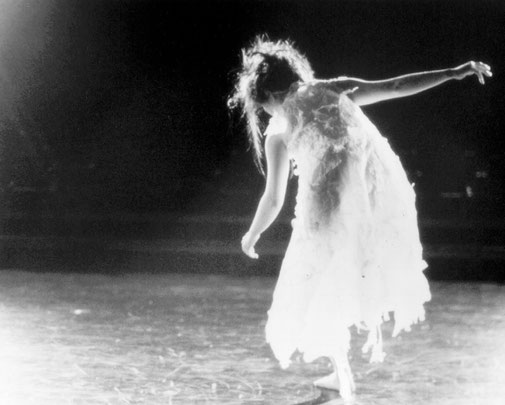b&w photo of dancer on stage