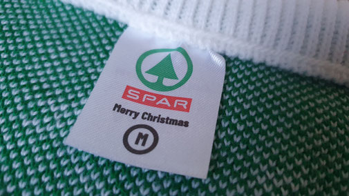 Gepersonaliseerd label in je foute bedrukte kersttruien