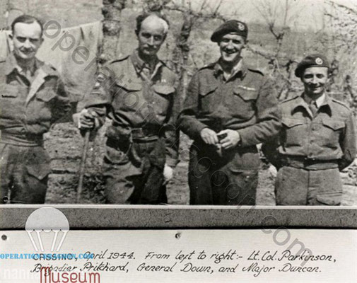 Brig PRITCHARD (2nd from left) just after he was injured in the head by a shrapnel. This picture was taken near Monte Cassino, with Lt Col PARKINSON ( 127th Field Hospital CO), General DOWN ( 1st Airborne Division CO ), and Major DUNCAN ( 64th LAA CO)