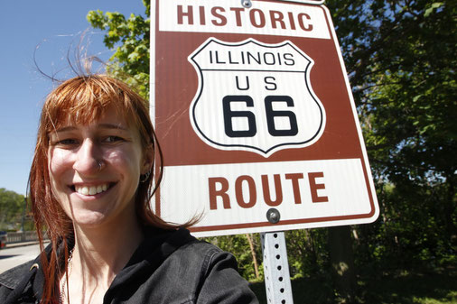 Blogger in front of Route 66 sign Illinois