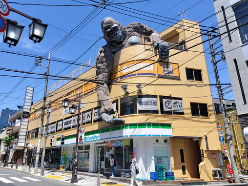 Gorilla-topped convenience store near the station
