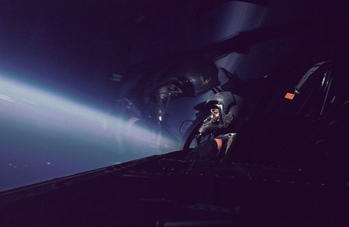 A JASDF pilot searches the sky for the 'enemy' in a Cope North air-to-air combat exercise.