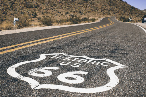 Route 66 sign on the road in California