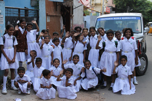 Children of the Happy Home coming back from school.