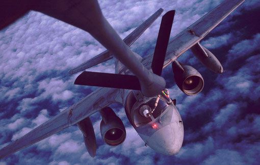 A thirsty S-3 subhunter takes fuel from a flying tanker.