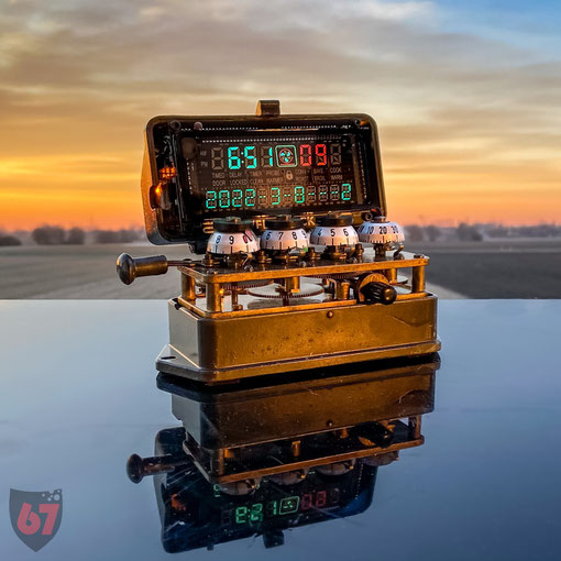 Upcycling artwork with antique found objects - mechanical counter and modern VFD clock display - JayKay67Design by Jürgen Klöck