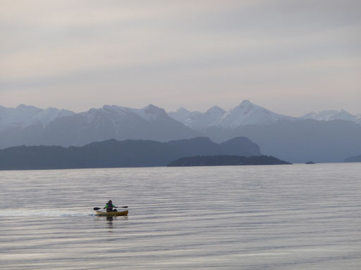 a sea kayak headed in from a days adverture