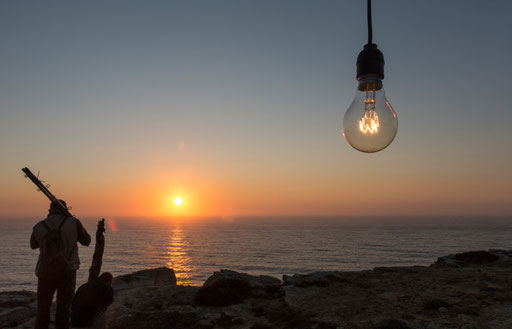 Fishermen walk down the escarps to the seaside in Assafora village on 2015.