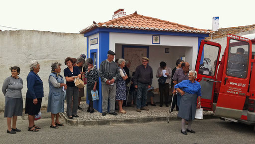 Senior citizens queue to receive their pensions in Assafora 45 km North of Lisbon June 1, 2011