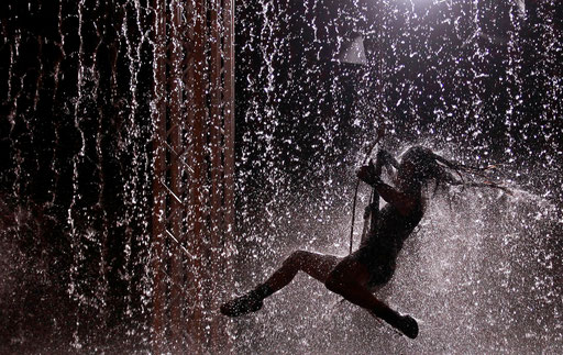 Artist performs during the Waterwall show in Lisbon August 5, 2011.