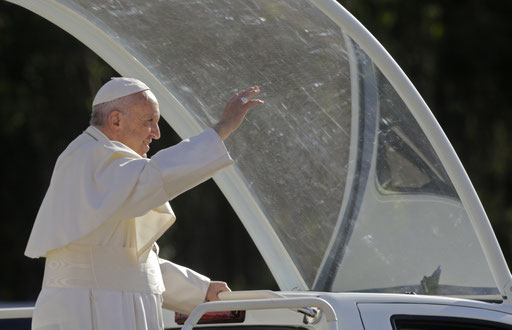 Pope Francis waves on his way to the Fatima shrine May 12, 2017. 