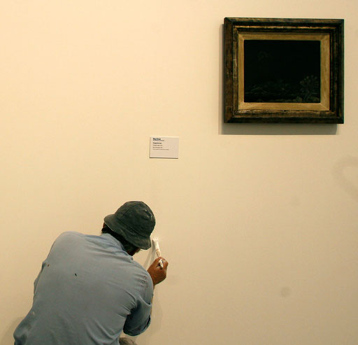 A worker gives final touches to the walls in the Berardo Museum of Modern and Contemporary Art in Lisbon June 25, 2007.