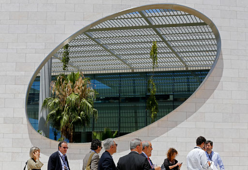 Medical conference participants take a walk during a coffe brak at Champalimaud Conference Center in Lisbon on 2015