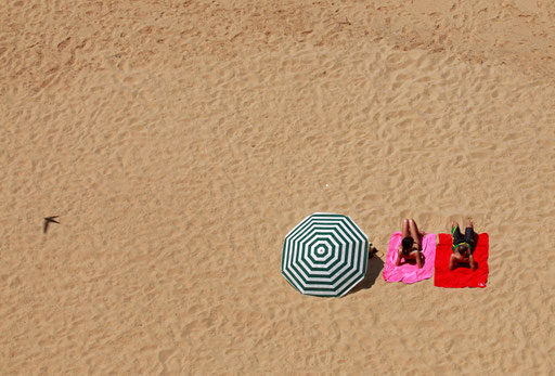People get tan at Ericeira beach  North of Lisbon May 11, 2011.