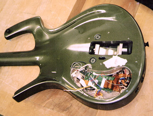 One of the downsides of thos guitar: The electric components are very complicated for an average guitar player to work on.  Click to enlarge the whole mess!