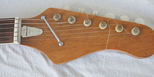 Typical for these MIJ guitars: The "STEEL REINFORCED NECK". A straight steel rod is a truss rod that does not work well. Can`t be adjusted. But beautiful wood! Click to enlarge.
