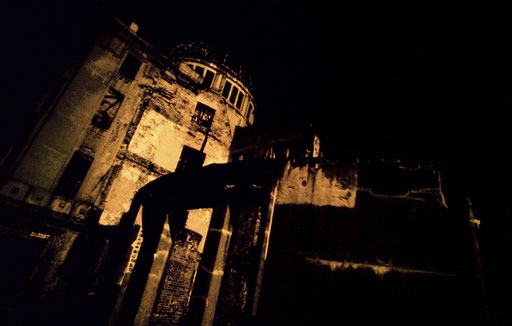 A false-color infrared image of the Hiroshima Dome.  The color and contrast are intended to evoke the searing heat and blinding light of a nuclear detonation.