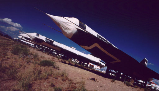 Once super-secret Mach 3+ D-21 reconnaissance drones, built to be launched from SR-71s, are sealed in 'mothball' storage at AMARC. The D-21s were to spy on China's Lop Nor nuclear test site. Four missions were attempted; none succeeded.