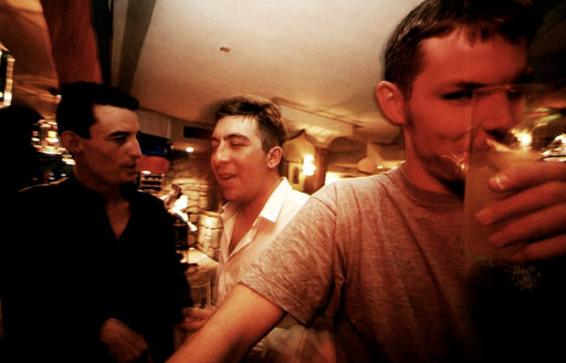 Exams are finished and it's Saturday night: university students in a bar, Salamanca, Spain.