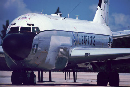 Studded and swollen with grotesque antennas, "Ghost Rider" -- an RC-135 Rivet Joint electronic reconnaissance aircraft -- rolls out for takeoff.