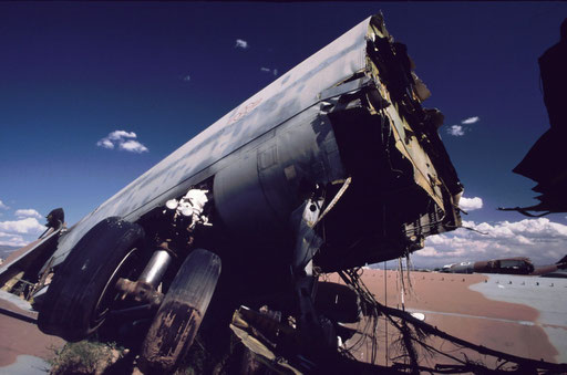 In compliance with the START I provisions, the fuselage of a B-52G lies in the desert landscape of the Aerospace Maintenance and Regeneration Center (AMARC) at Davis-Monthan AFB, Arizona. It was severed by a huge, specially-built 'guillotine.'