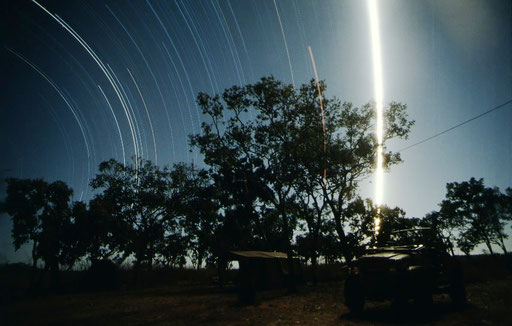 Moonrise over a hunters' camp; near the Katharine River, Northern Territory, Australia.