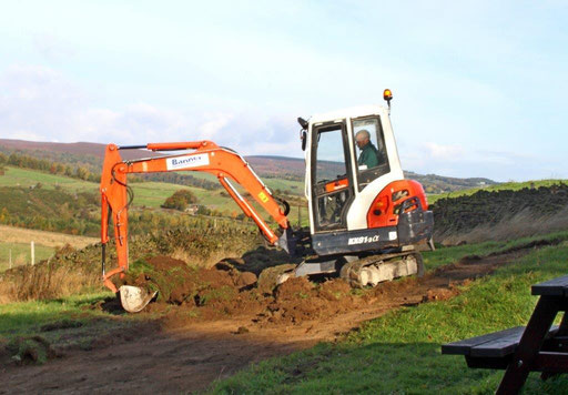 Scraping Topsoil in Wildflower Meadow