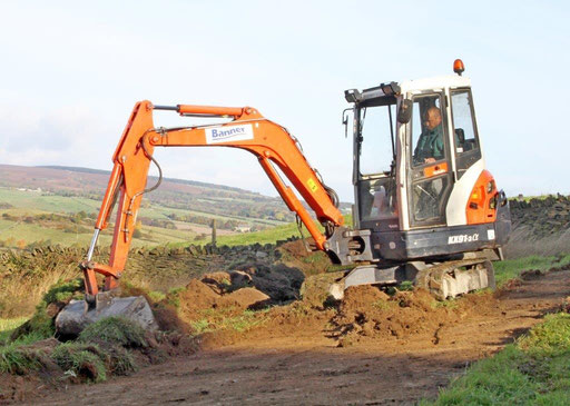 Scraping Topsoil in Wildflower Meadow