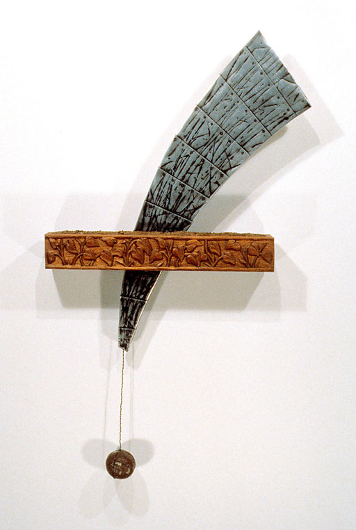 The Power: 24 x 4 x 44” carved wood, metal flashing, rock, dirt