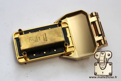 Quincaillerie ancienne Louis Vuitton pour restauration de valise.