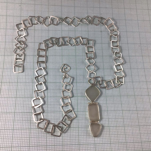 This graph-ic sterling silver chain proves it's hip to be square, especially with its unaltered geometric sea glass pendant. 